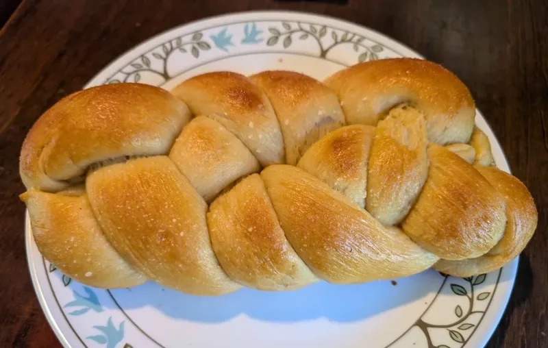 A four-strand garlic onion challah